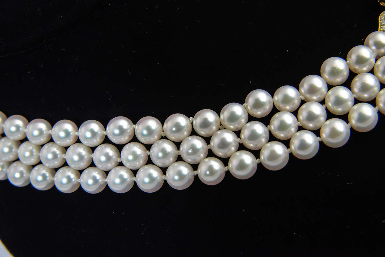 Mikimoto Triple Strand Pearl Necklace with Diamond Flower at 1stDibs | triple strand pearl 