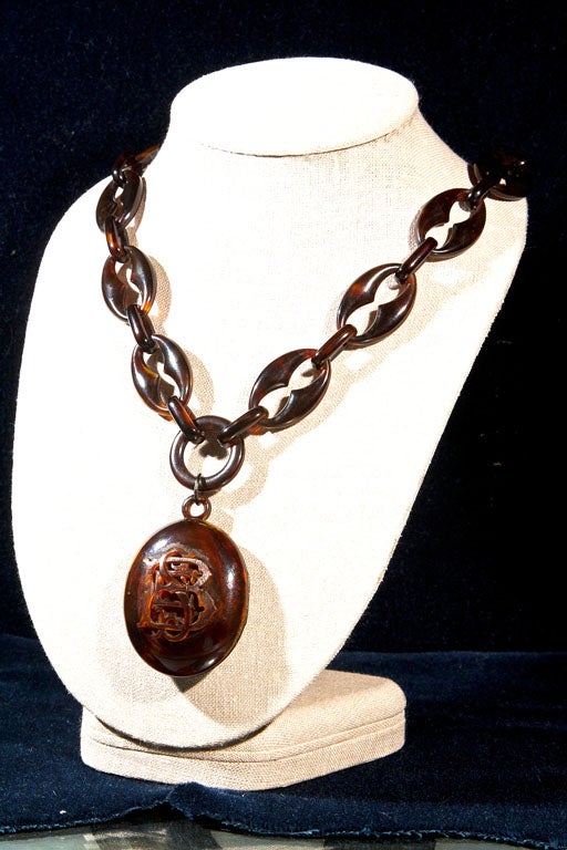 LARGE TORTOISE SHELL LOCKET WITH RAISED RELIEF WORK ON CHAIN LICK CHAIN..19TH  CENTURY