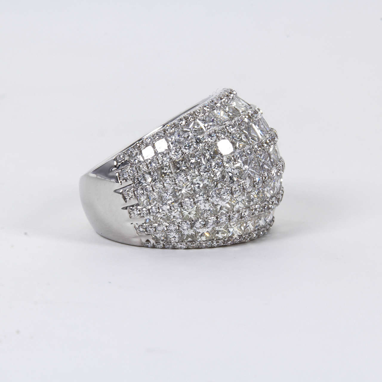 An exceptional design, handcrafted in Italy.

7.31 carats of princess and round cut diamonds set in 18k white gold.

Approximately 18 mm in width from widest points.

A perfect right hand ring that can be worn daily or for special occasions.