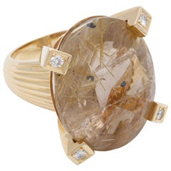 A rutile quartz and diamond dress ring