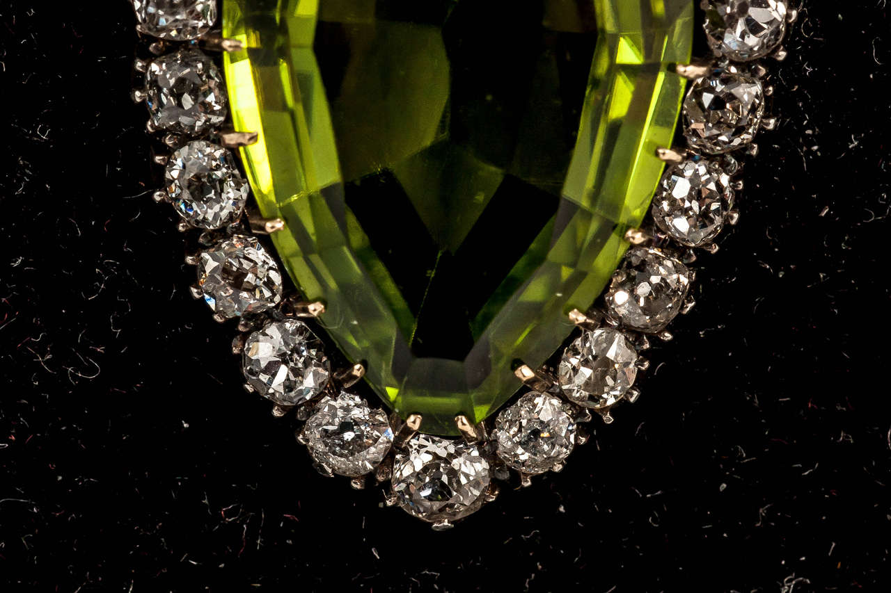 Rare Victorian fine colour peridot and diamond pendant on original bale. Set in Silver and 15ct Gold