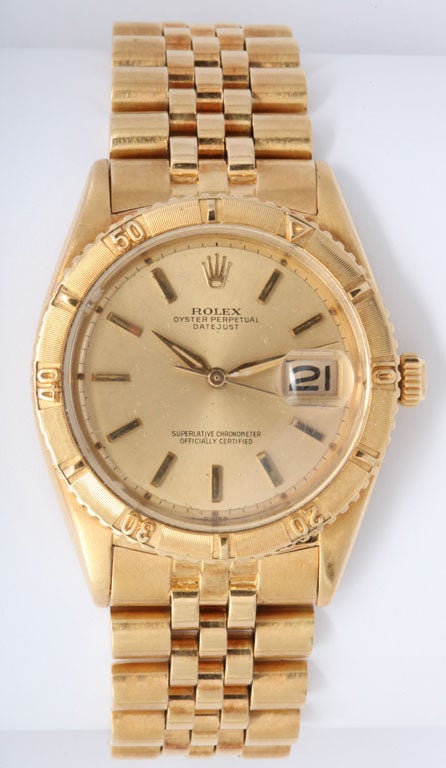 This vintage 18k yellow gold Rolex Oyster Perpetual Datejust Thunderbird Ref 1625 is from the 1950s. It comes with the original box, paperwork and Rolex service history. The rotating bezel distinguishes the Thunderbird or Turn-O-Graph from other