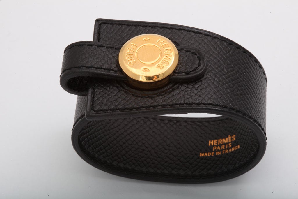 Very rare Hermes leather bangle in black/gold.