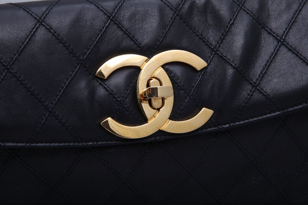 CHANEL QUILTED CLUTCH BAG 2