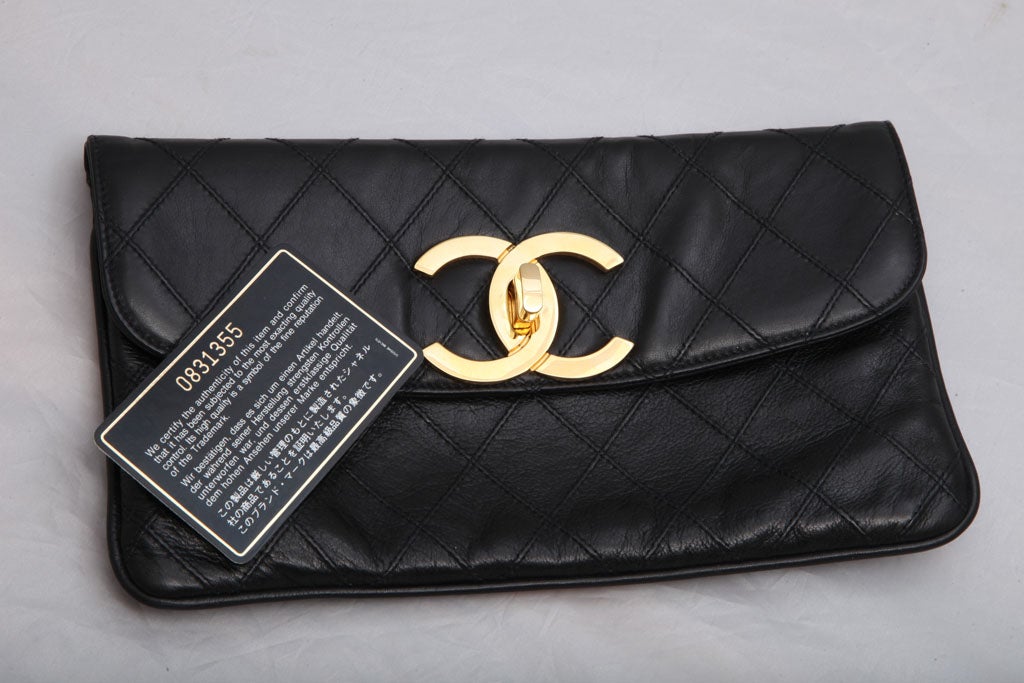 CHANEL QUILTED CLUTCH BAG 4