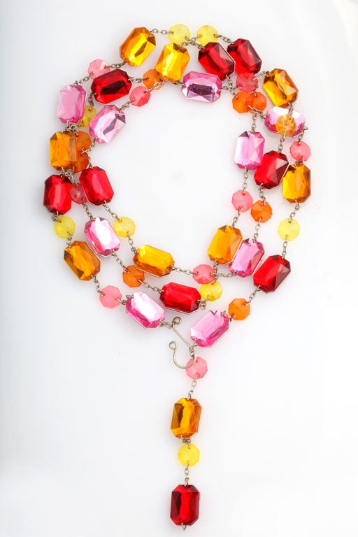 Wild red, pink,, orange, and yellow rhinestone chain. Makes a great necklace too.