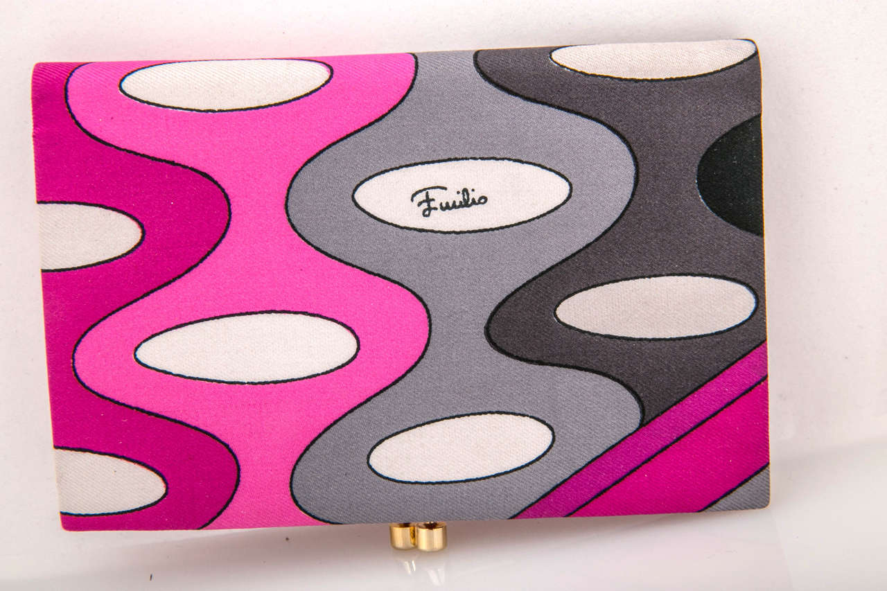 never used, new with tag vintage pucci clutch wallet featuring the house's most renowned print: 'vivara'. opulent pink leather interior. giftworthy