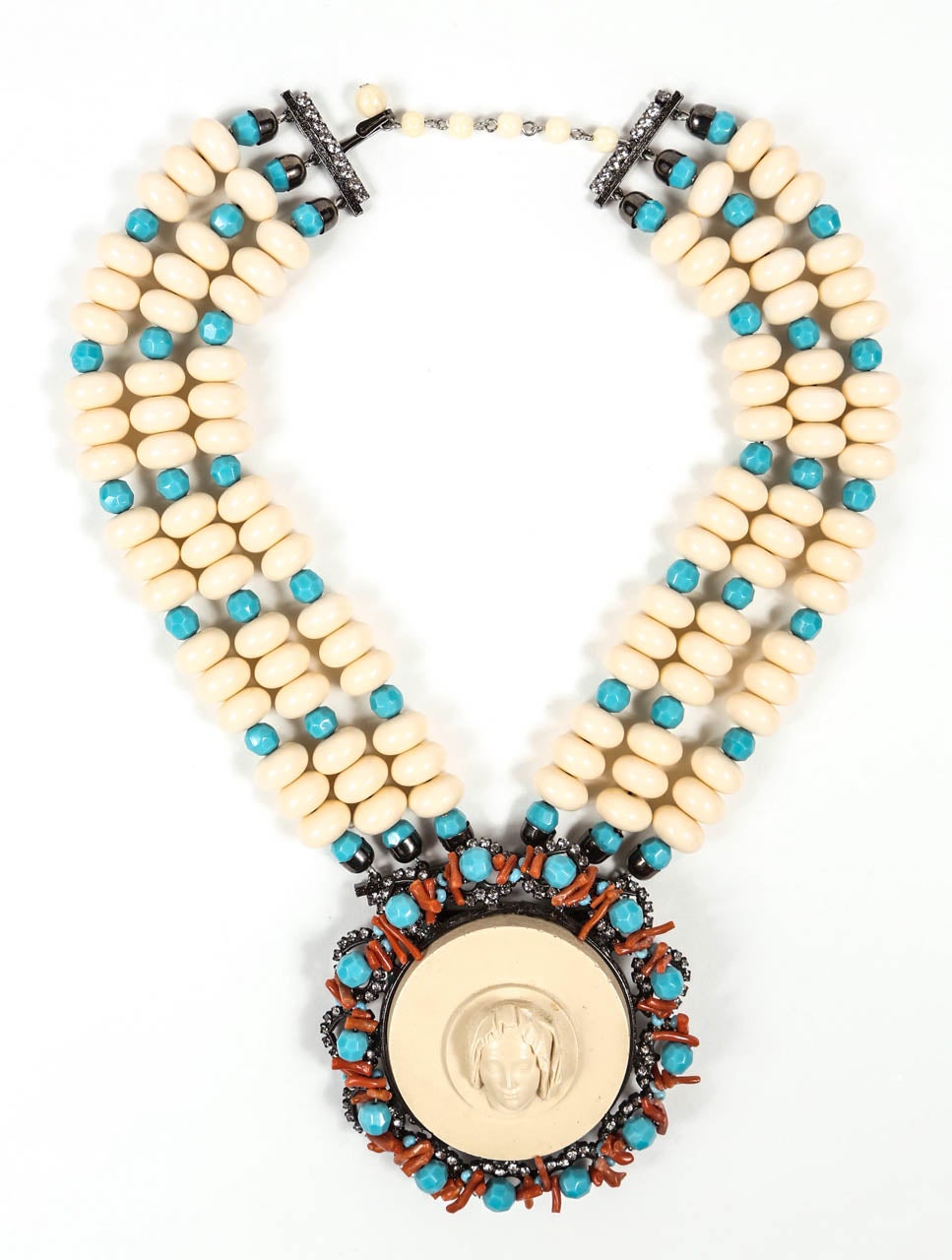 A dramatic necklace & ear clip set by noted costume jewelry designer Lawrence Vrba, who worked for Miriam Haskell before launching his own line. The large-scale pendant/brooch, which measures 3 5/8