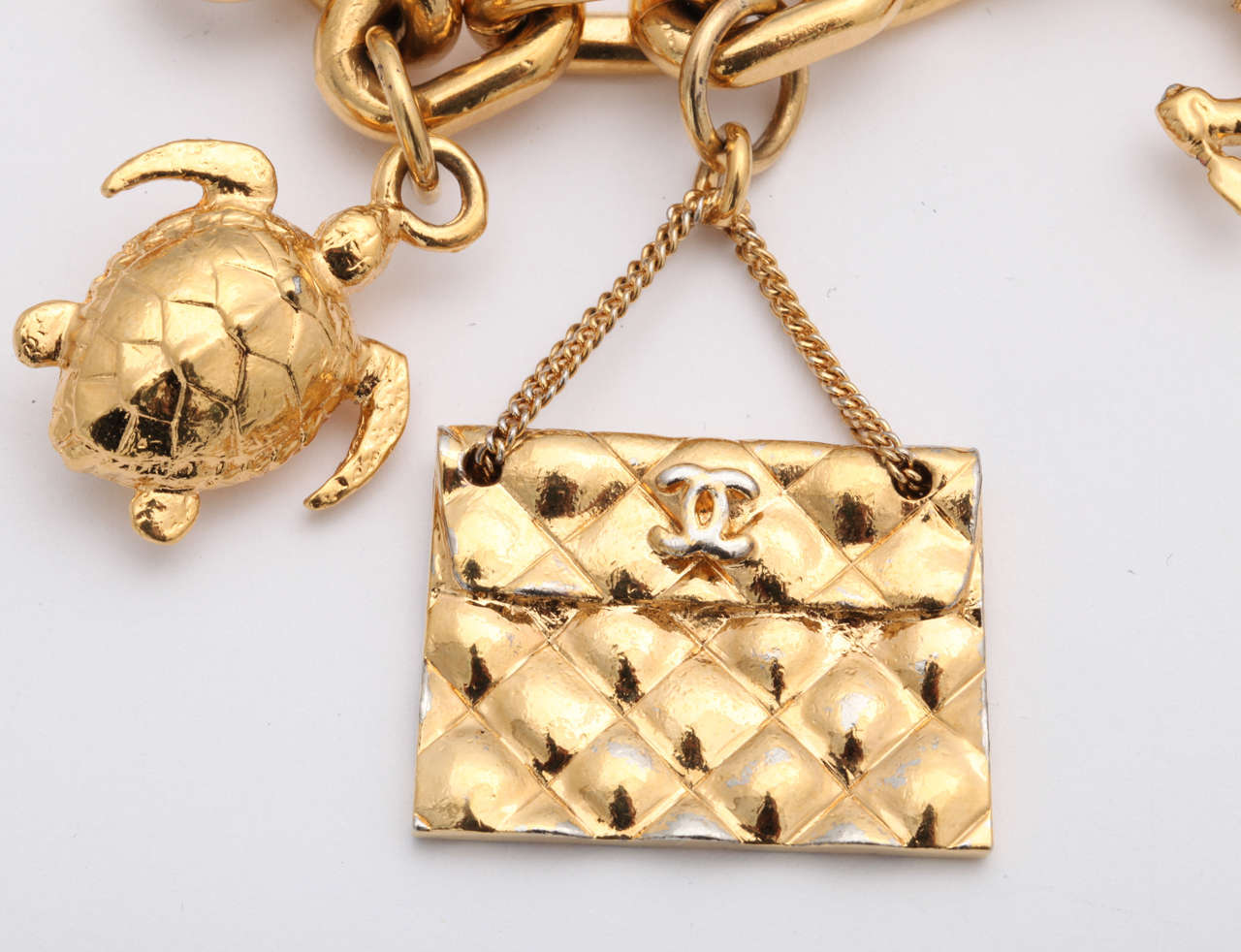 Chanel Vintage Iconic 7 Charm Bracelet In Excellent Condition In Chicago, IL