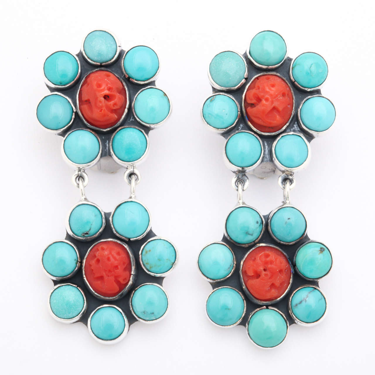 These South West style turquoise and coral earrings are just what you need for casual summer get-togethers.  They are handmade in California by Federico.
The clips make them comfortable to wear and easy to put on and take off.