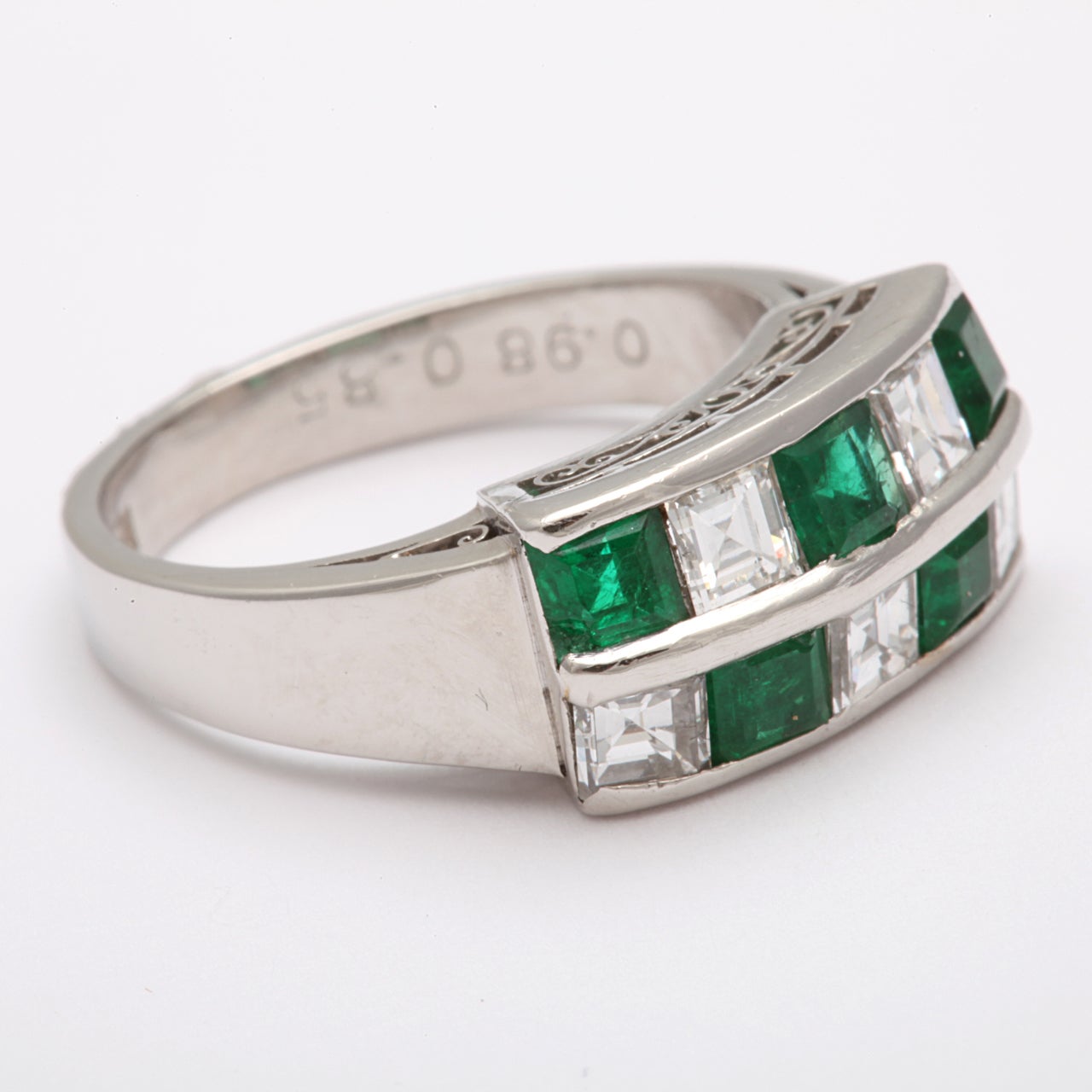 emerald and diamond channel set ring
