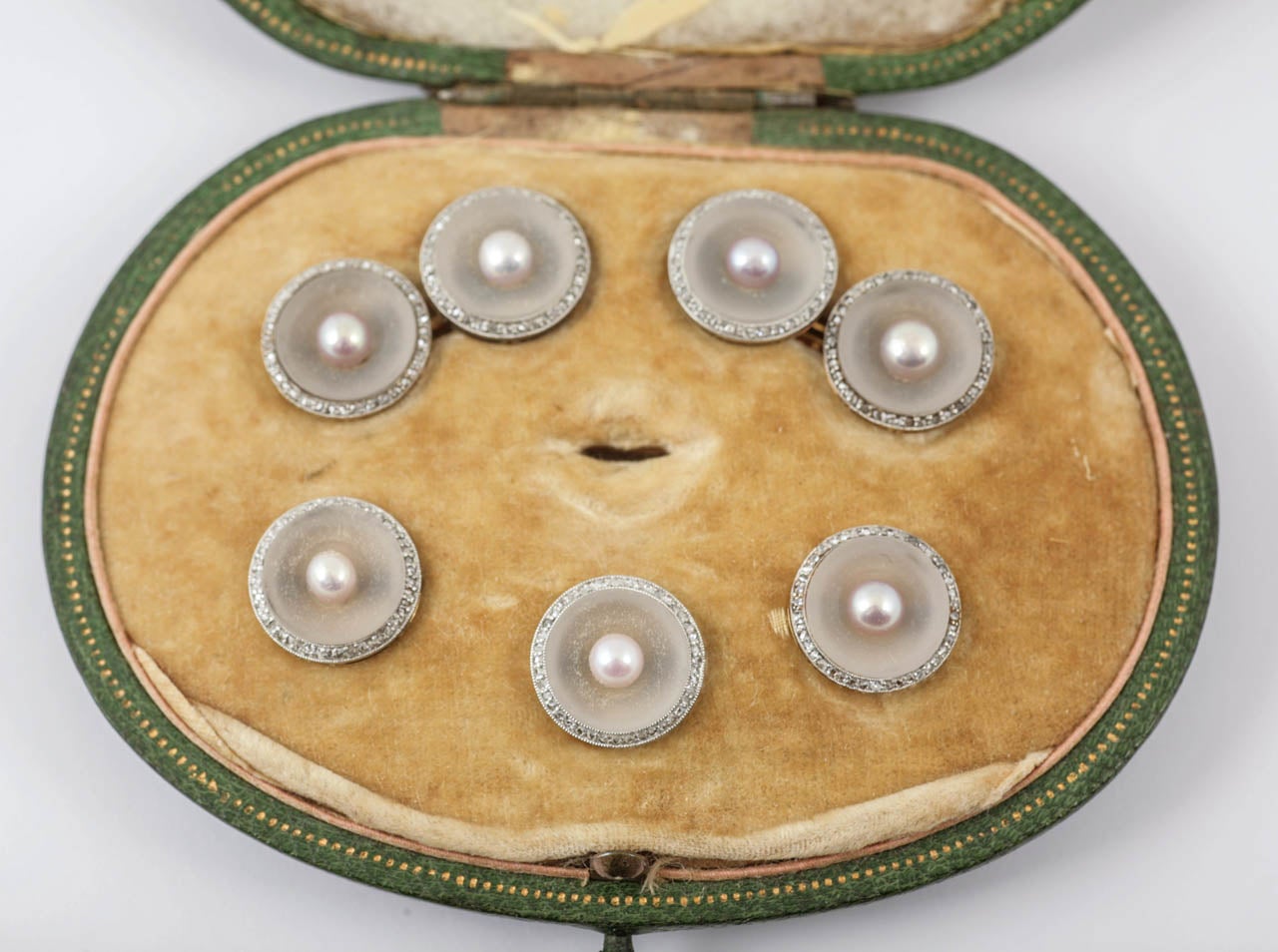 Fine set of natural pearl, crystal and diamond cufflinks and three buttons. Original case by KOCH, c1900-10.