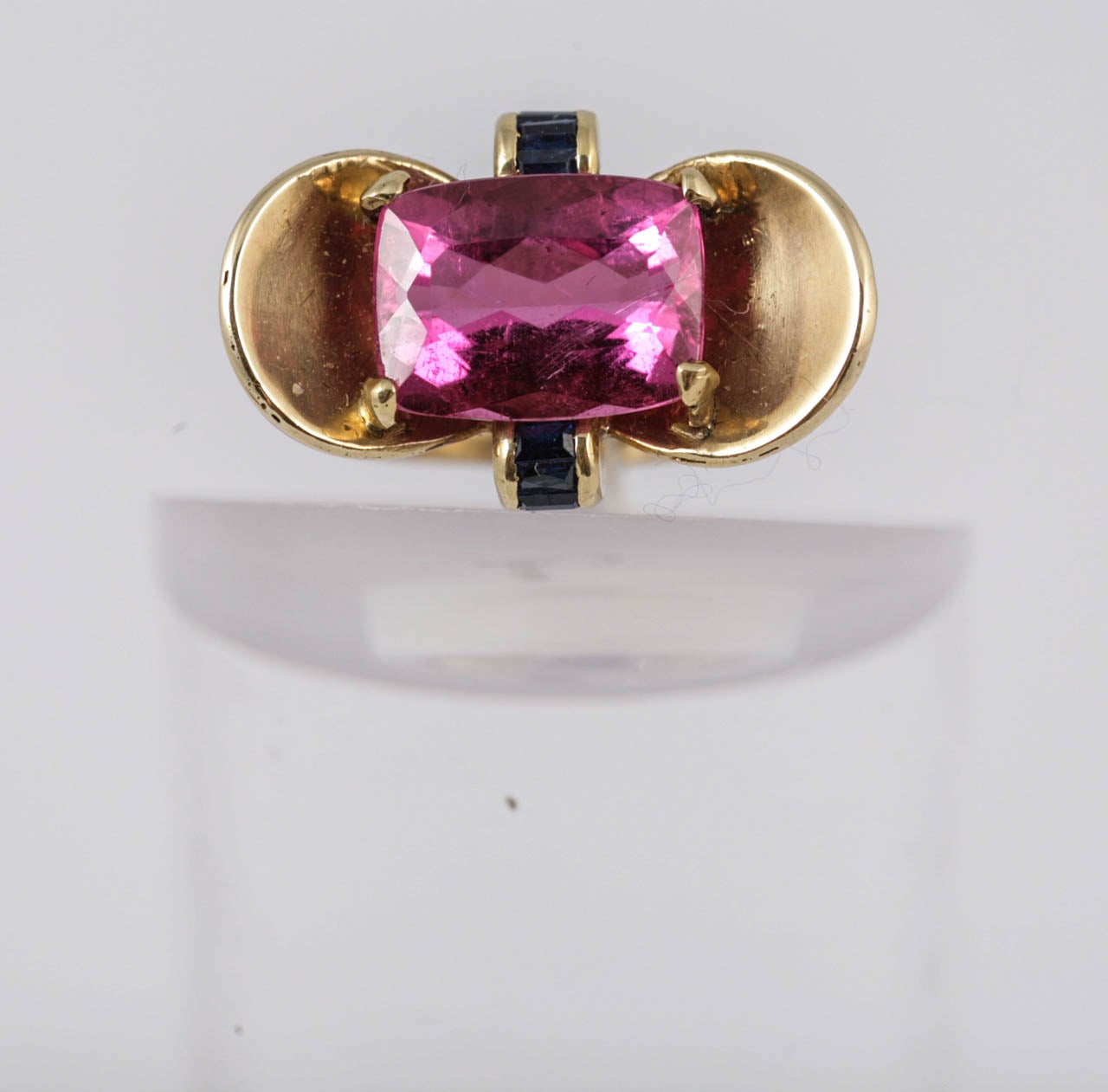 Pink Tourmaline with Sapphire accents set in 18K Gold.