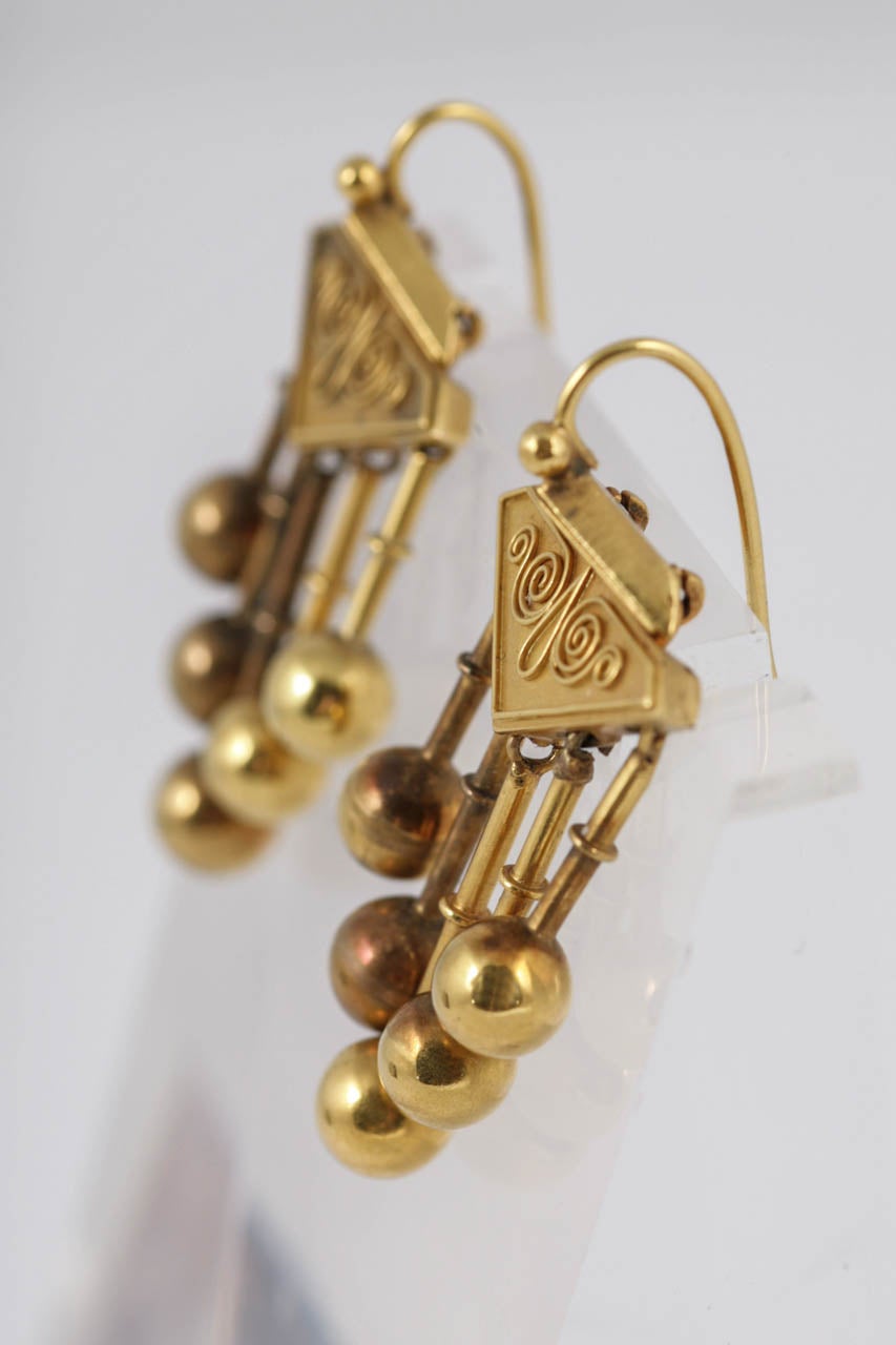 15K Gold drop earrings with Etruscan accents with shepherd's hook fittings.