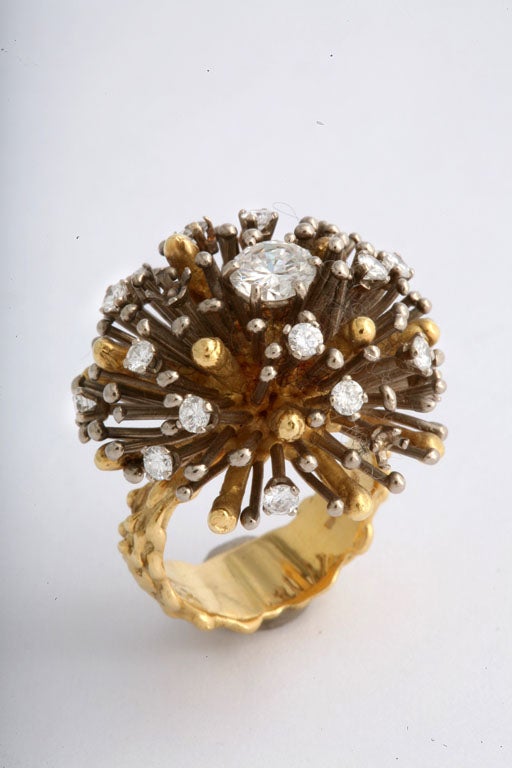 A really striking ring designed by David Thomas, an important jeweler working in London during the 1960’s. Thomas exhibited his jewelry at the Goldsmith’s Hall, and was known for his artistic pieces with hand-wrought gold. This ring was designed to