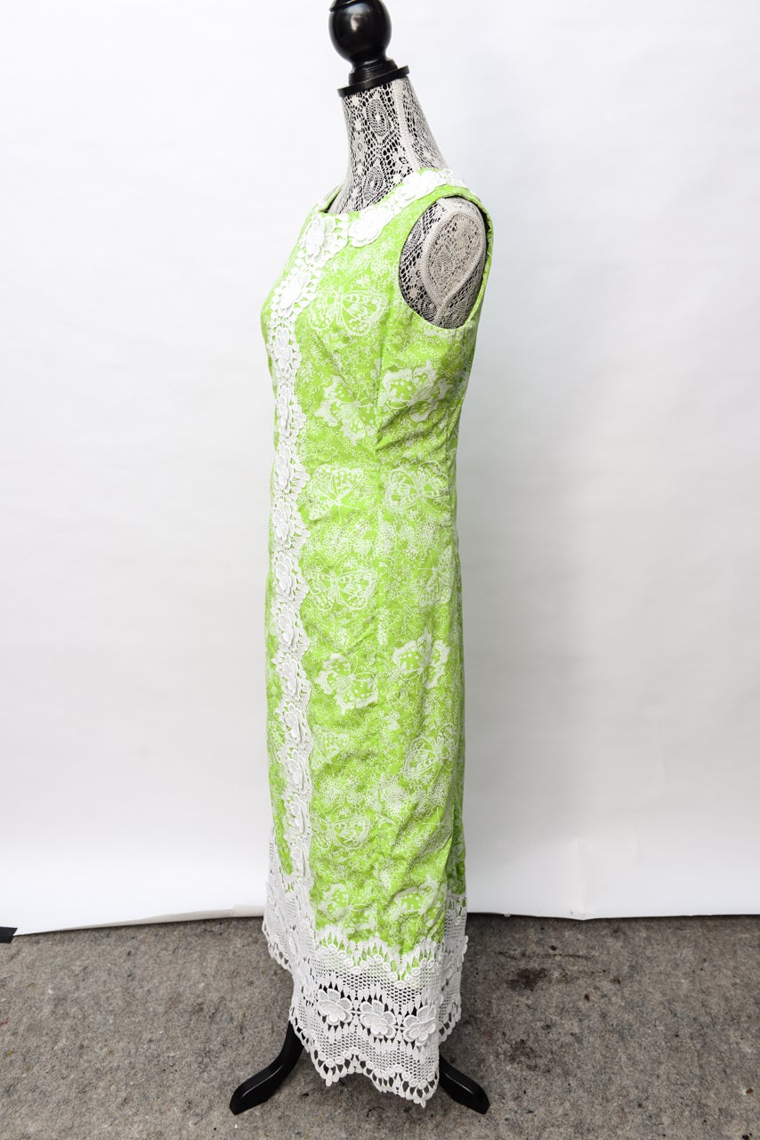 Signature brilliant lime patterned vintage Lilly sundress. Applied lace trim all down front, collar and base. This version is full length which helps carry over into early evening.