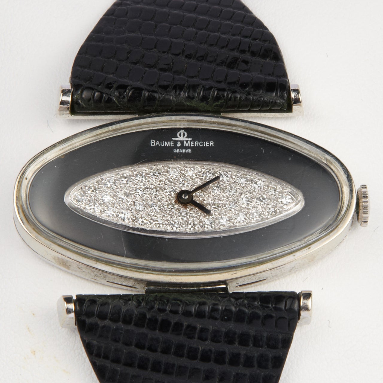 Baume & Mercier 14k white gold, onyx and diamond wristwatch.
