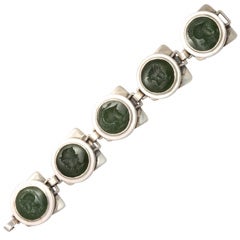 Handwrought Sterling Silver Bracelet with Intaglio Jade Links