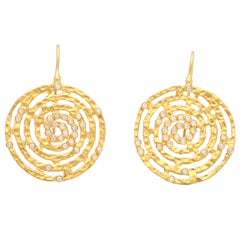 sterling silver,  yellow gold and diamond earrings