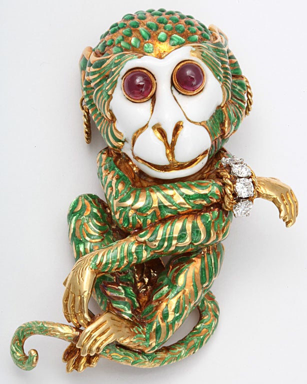 18k gold monkey with cabochon ruby eyes diamond bracelet and twisted wire earrings,  beautiful green and white enamel