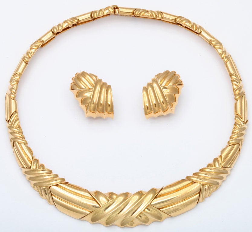18k yellow gold graduated, segmented collar necklace with matching ear clips