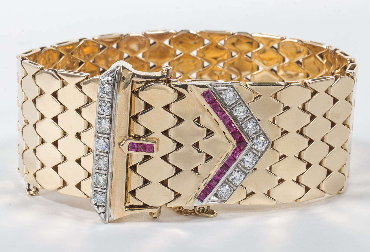 14k yellow gold adjustable bracelet.

approx 1.40 carats of diamonds with ruby.