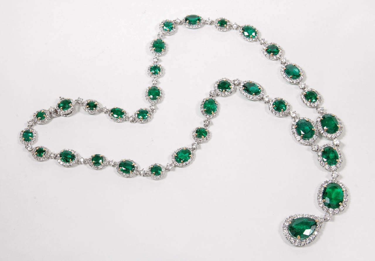 
A gorgeous design of quality brilliant oval, round, and pear shaped emeralds set with round brilliant cut diamonds. 

35.80 carats of Fine Green Emeralds -- fabulous luster and rich color.

14.14 carats of Diamonds

18k white gold