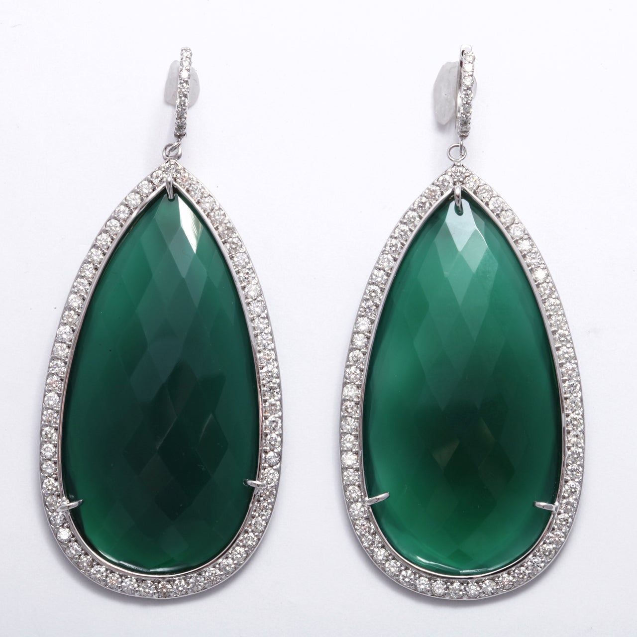 Vibrant green agate earrings flanked with numerous diamonds weighing 4.17 carats, in 14k white gold. Can custom make them any size, color or metal.