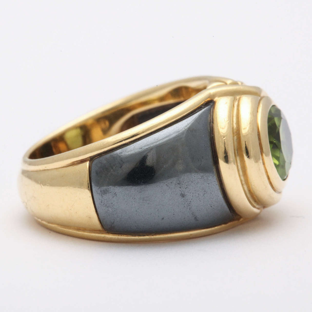 Bulgari Peridot Steel Gold Ring In Excellent Condition In New York, NY