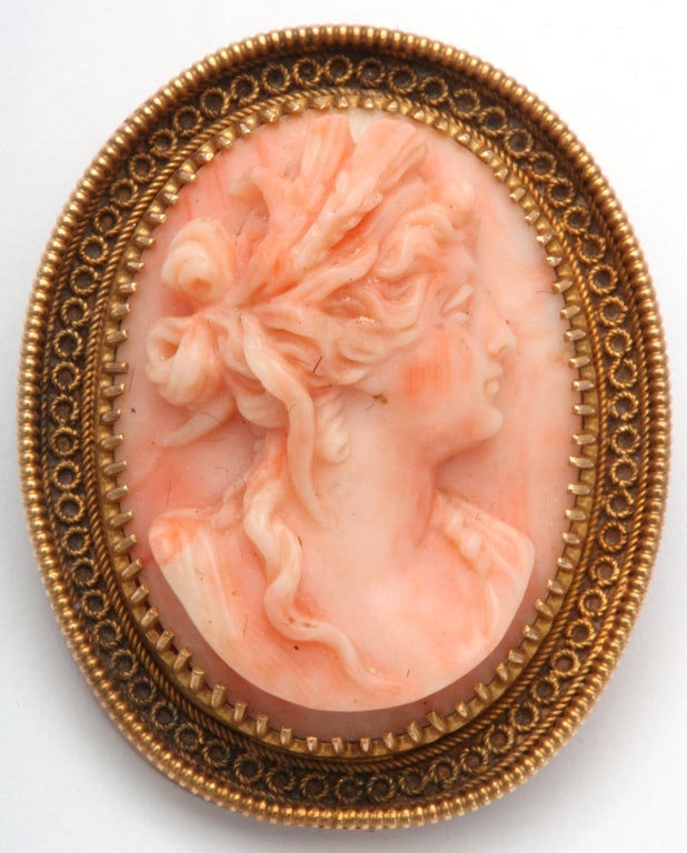 Lovely Victorian Coral Cameo in 15kt Yellow Gold frame embellished with granulation & beadwork.  Goddess facing right & wearing a leaf crown.  Cameo undoubtedly carved in Italy during the 19th c & mounted in England during the late 19th c.