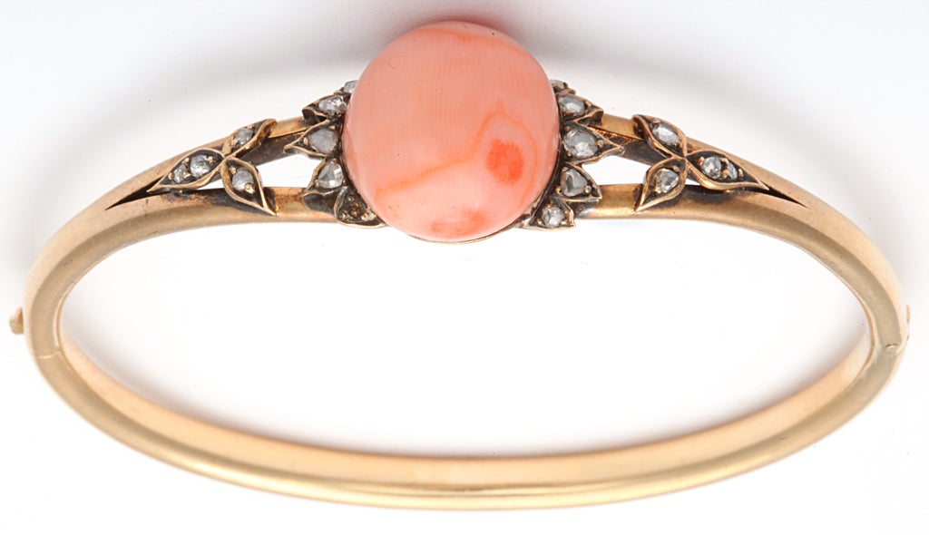 Hinged 18kt Rose Gold Bangle with Center Salmon Coral Bead & flanked by Rose Diamond Floral Mountings