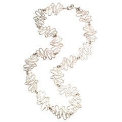 Make Waves in an Abstract Modernist Necklace