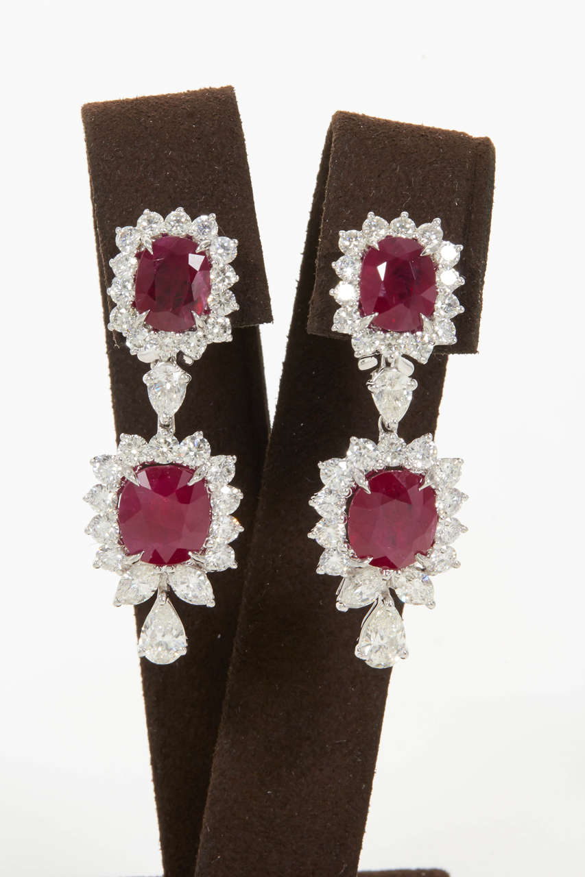 Fabulous earrings -- a rare find!

15.85 carats of certified Burma rubies, 7.20 carats of diamonds.

Handmade in New York, set in platinum.

Each ruby is accompanied by a certificate stating Burma as origin.

A real collectors piece!