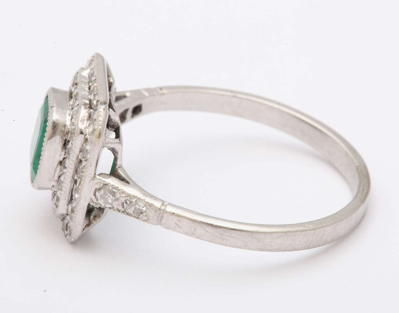 Art Deco 1920s Platinum Diamond and Emerald Ring For Sale