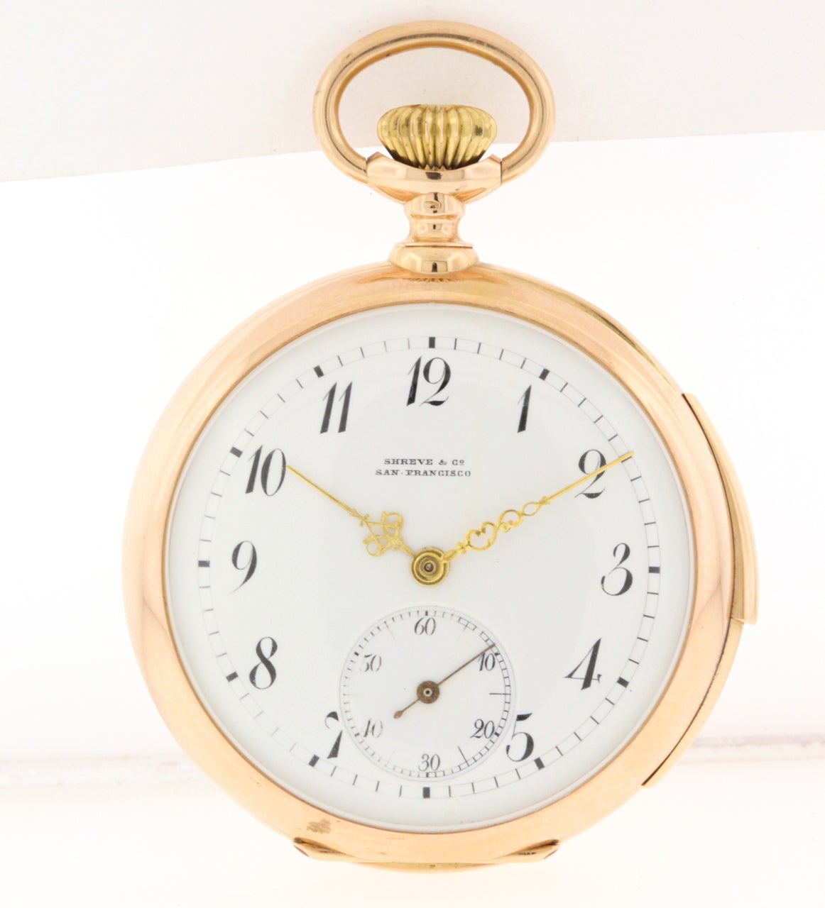 18K yellow gold minute repeating pocket watch, circa 1900 made for retailer Shreve & Co. by Ulysse Nardin, Le Locle, Switzerland. 

18k yellow gold 49mm polished case with hinged gold cuvette, back monogram with crown design, white enamel dial