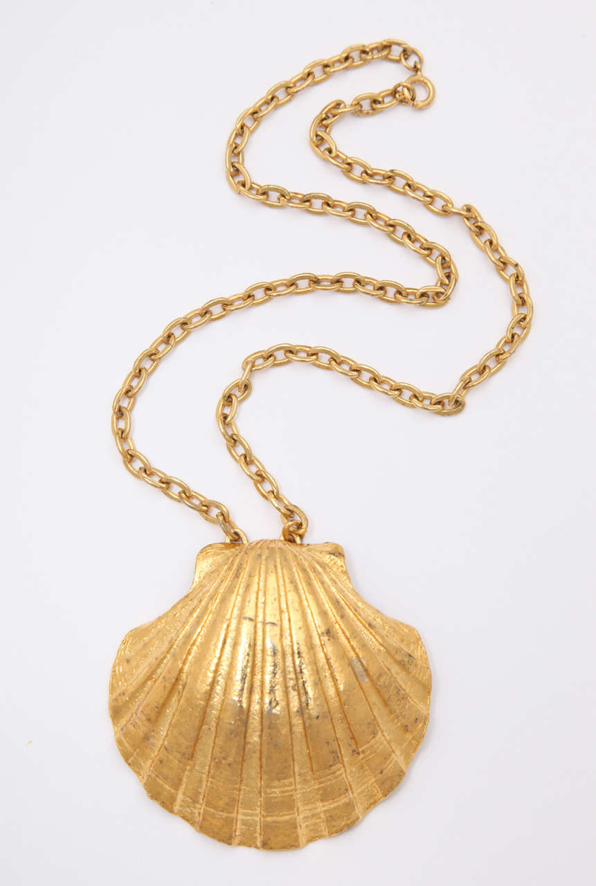 Single large shell necklace. Chain is 8.75