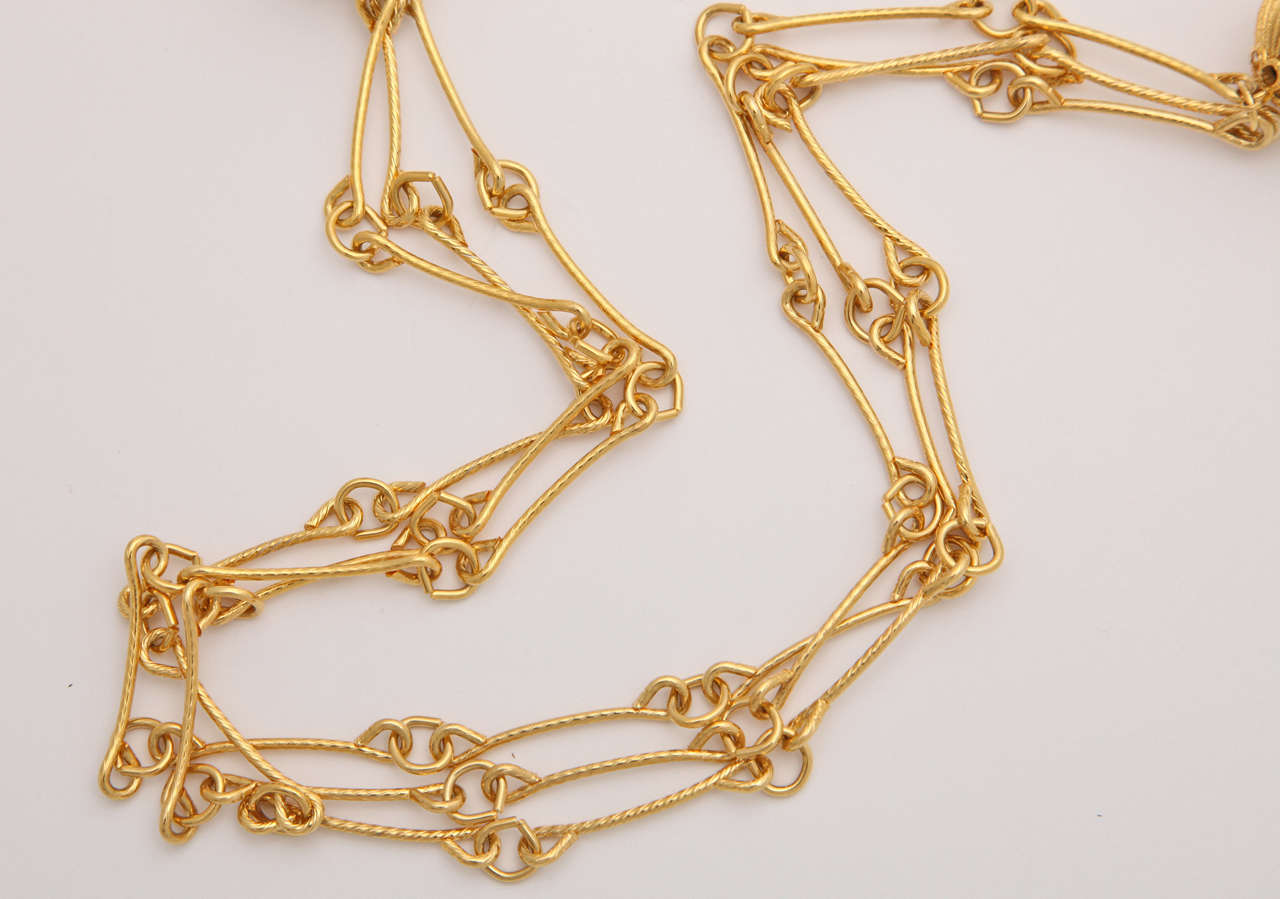 triple strand gold necklace