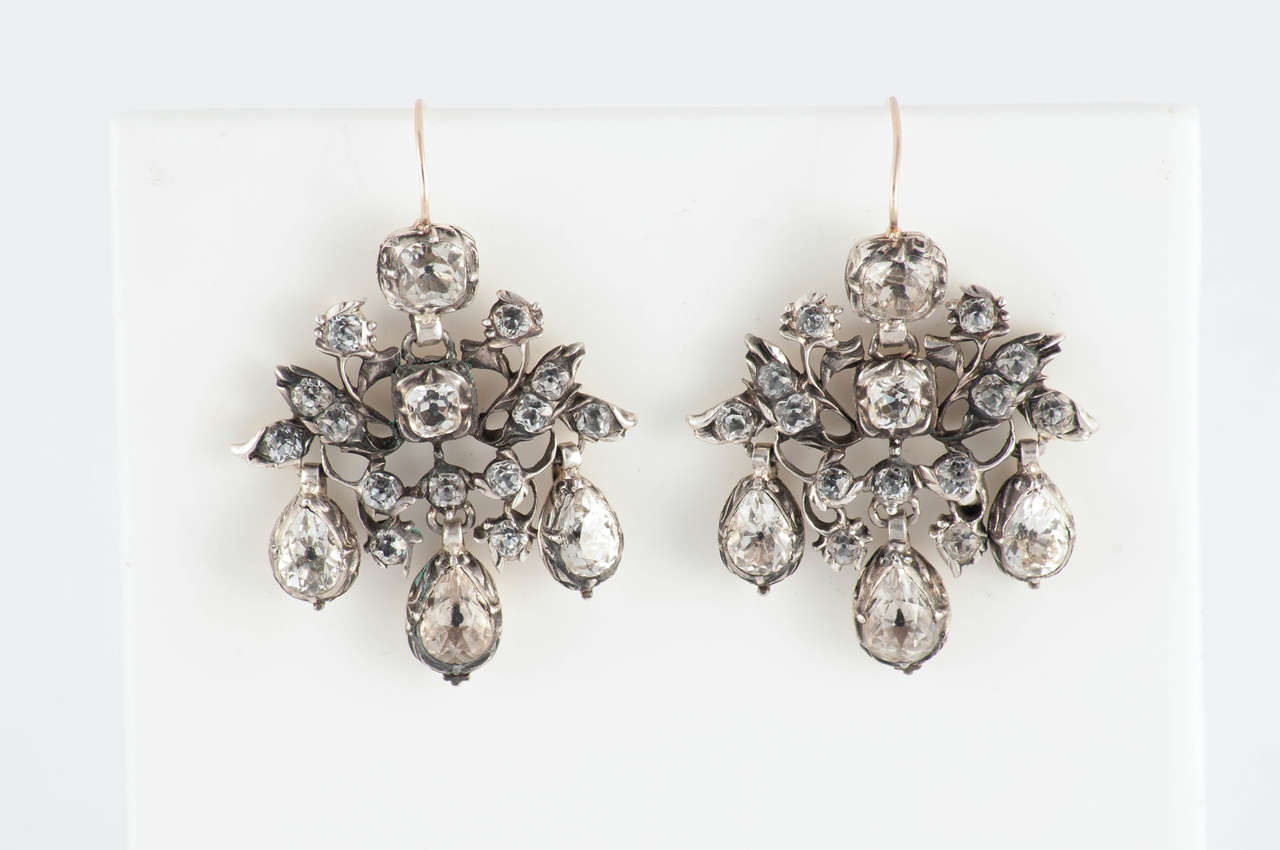 Rare Georgian leaf and floral motif cluster and drop paste earrings, set in silver with gold ear wires. Dazzling to wear for evening dress and in the daytime too. The earrings measure 1 5/8