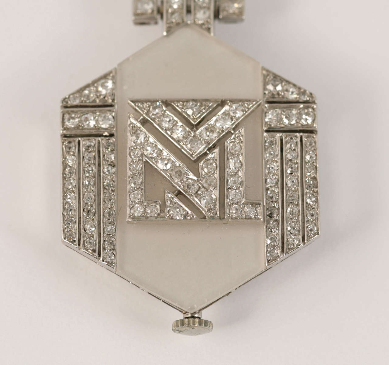 Art Deco tank style lapel watch in the style of Atot