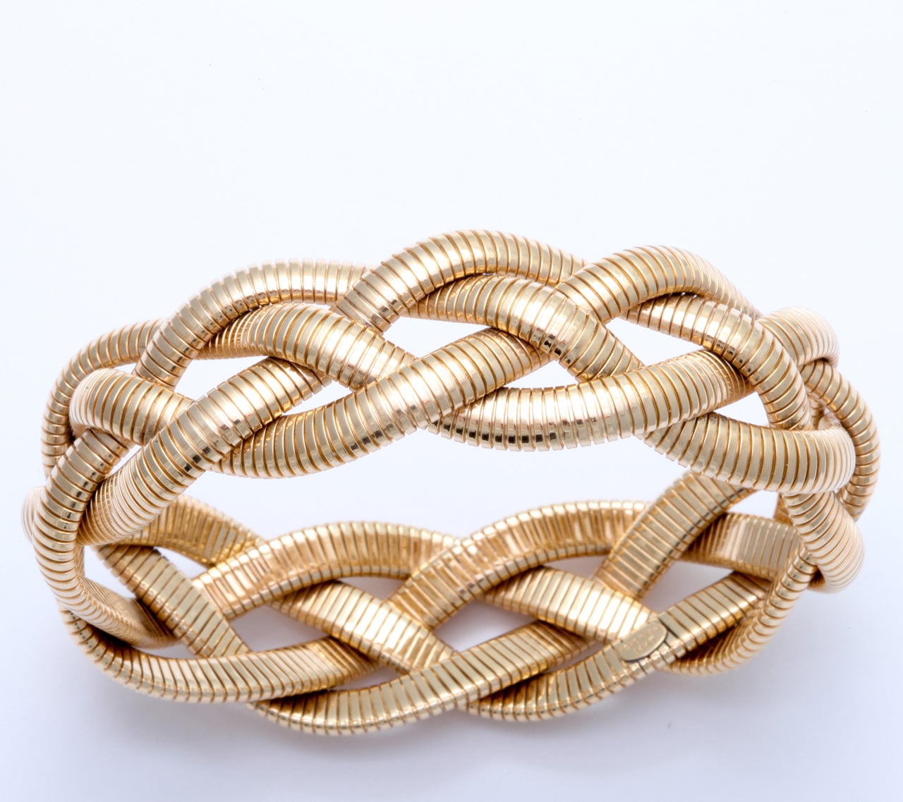 4 strand braided bracelet each strand 5.5 millimeters
20 millimeters at the widest point
54 grams
7