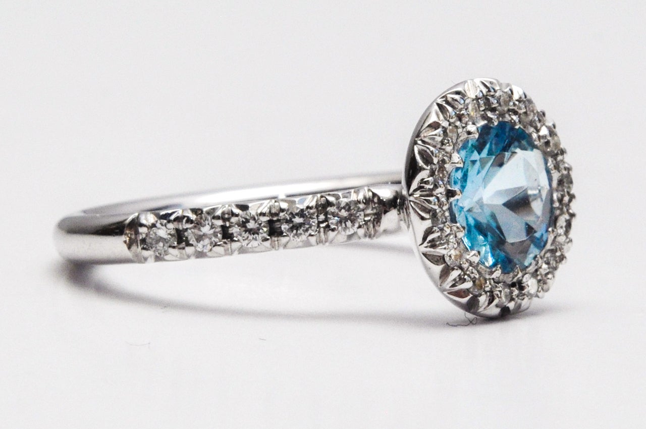 Aquamarine diamond cluster ring