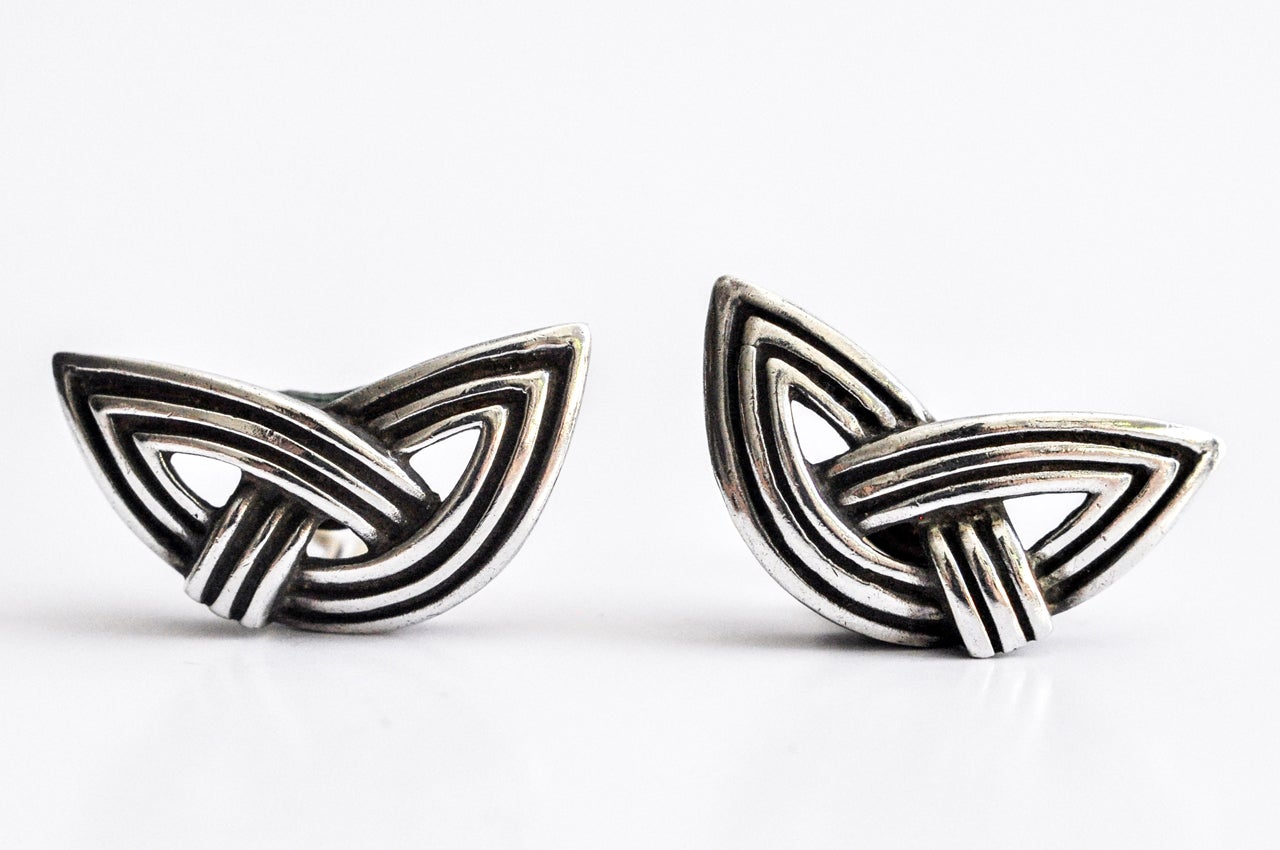 A pair of sterling silver clip earrings by the American contemporary jewelry designer Christopher Walling.  His pieces have been included in jewelry exhibitions throughout the world including The American Museum of Natural History in New York.
The