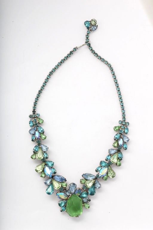 Beautifully crafted, prong set turquoise and green rhinestone necklace. Signed Weiss.