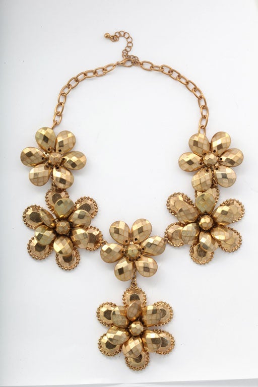 Goldtone five multi dimensional flower necklace.