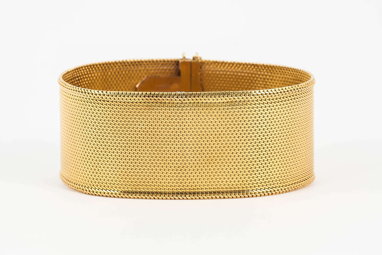 Finely made woven gold bracelet of silky smooth finish. French, marked circa 1870.