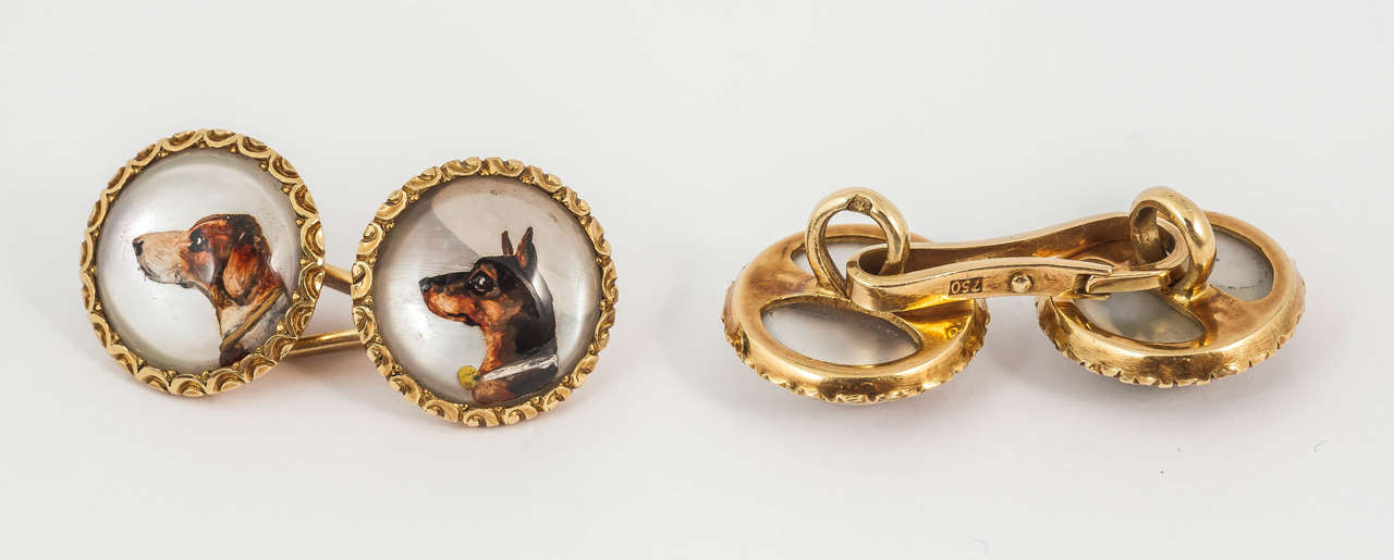 Fine quality pair of painted enamel crystal cufflinks mounted in gold of an Alsatian, Borzoi, blood hound, Doberman.
