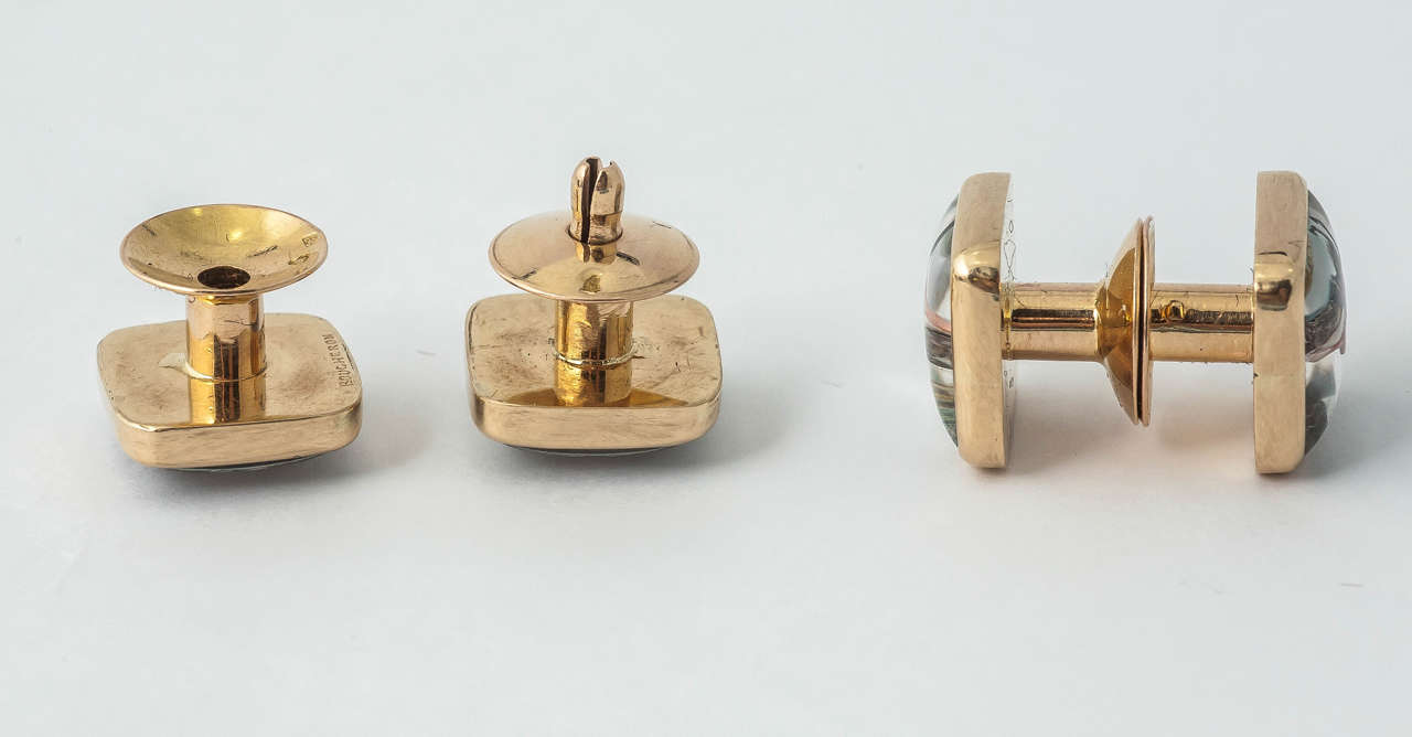 Fine pair of gold mounted painted crystal cufflinks of push together suction fit. Signed Boucheron with French marks, circa 1890.