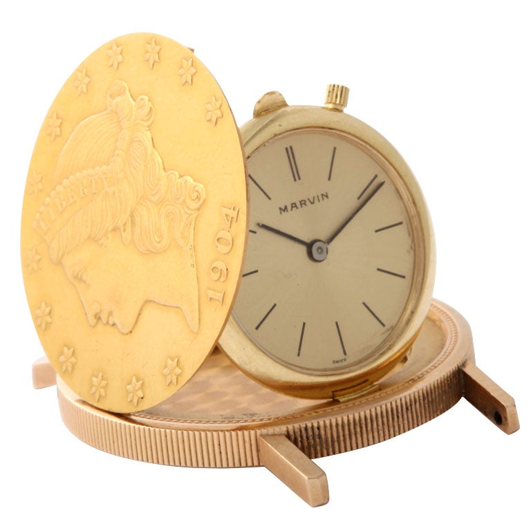 mechanical round wrist watch constructed of 2 US $20 goldpieces - spring loaded case with concealed 9 douzieme movement