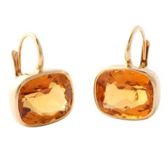 gold bezel set citrine earrings on French wires