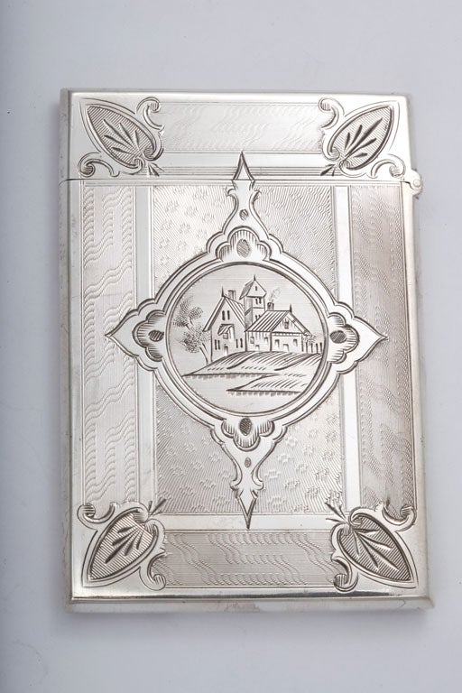 Coin Silver calling card case, New York, Ca. 1850's, Albert Coles - maker. Beautifully bright cut and engine-turned, having a house etched into the cartouche on one side; the cartouche on the reverse side reads 